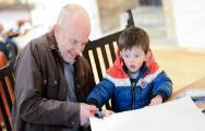 Man and child crafting